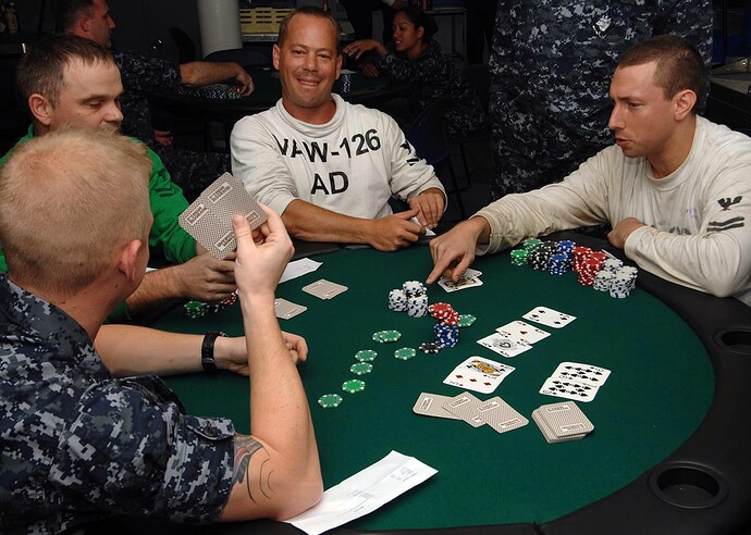 US_Navy_090620-N-2798F-033_Sailors_assigned_to_the_aircraft_carrier_USS_Harry_S.Truman(CVN_75)and_Carrier_Air_Wing(CVW)3_compete_in_a_Texas_Hold'Em_Poker_tournament_aboard_Harry_S._Truman